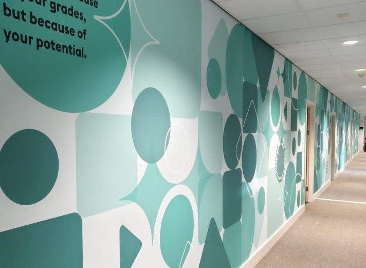 Turquoise and white geometric wallpaper installed by CSDPrint